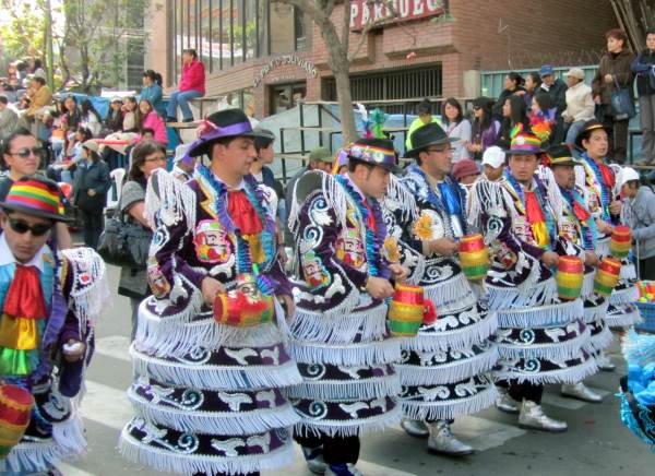 A carnival procession, with elaborate costumes