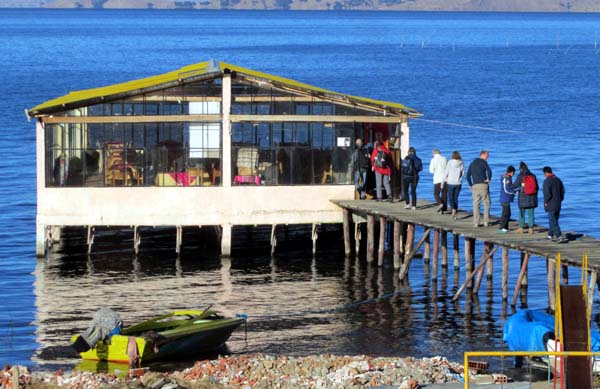 A restaurant built on a large jetty over the lake