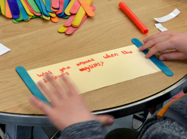 Making a scroll with a big question written on it