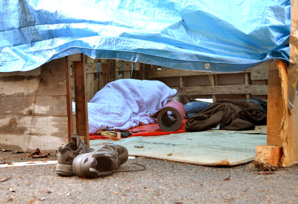 Asleep in a slum dwelling