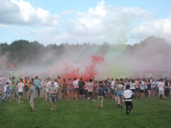 A lot of powder paint being thrown in the air