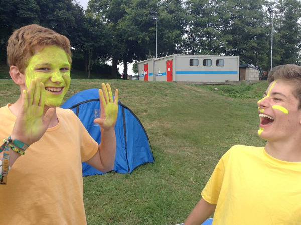 Faces coloured with fluorescent paint