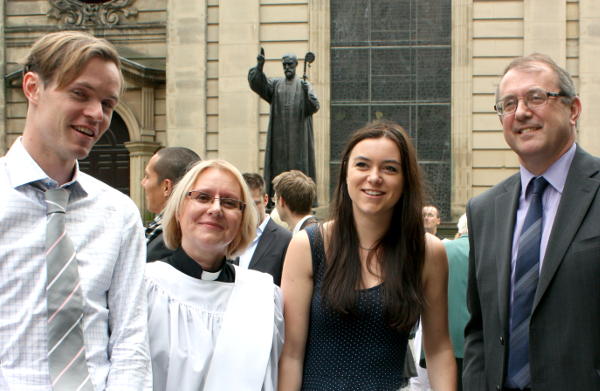 Megan with her family outside Birmingham Cathedral
