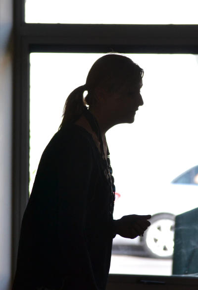 Ellen in silhouette: speaking at Messy Church