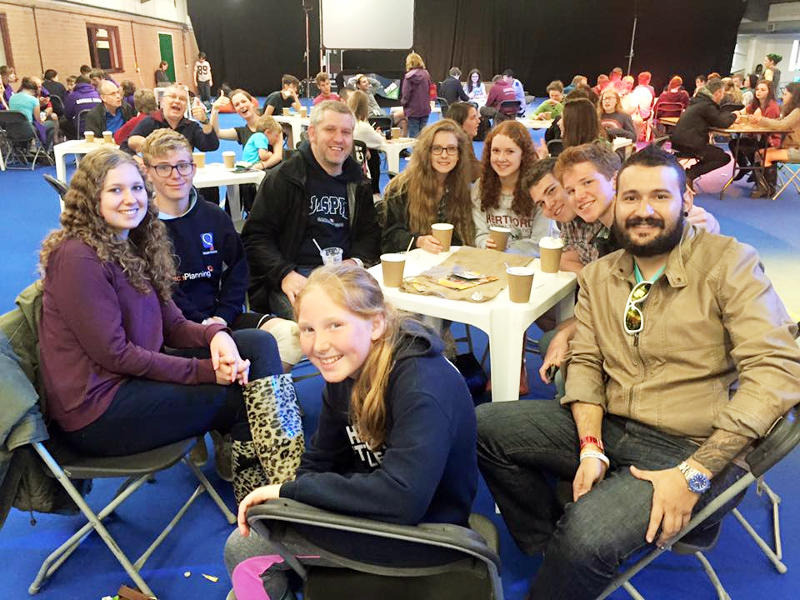 A large group in a café area