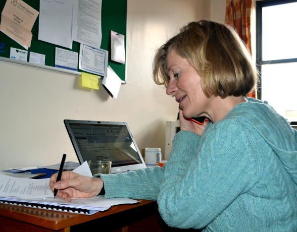 Judy Ward making a phone call