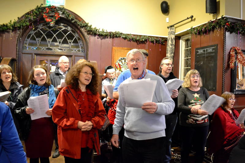 Carol singing at the Highbury