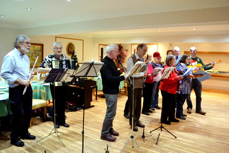 Carol singing at Neville Williams House