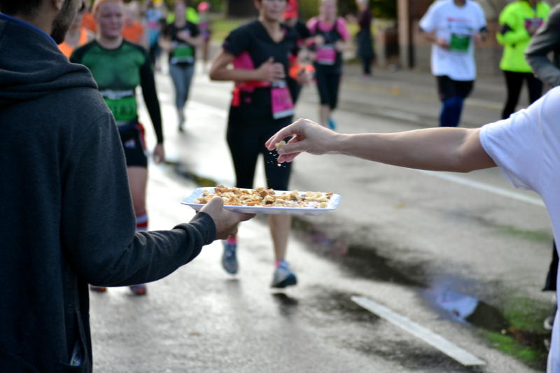 A runner taking some food