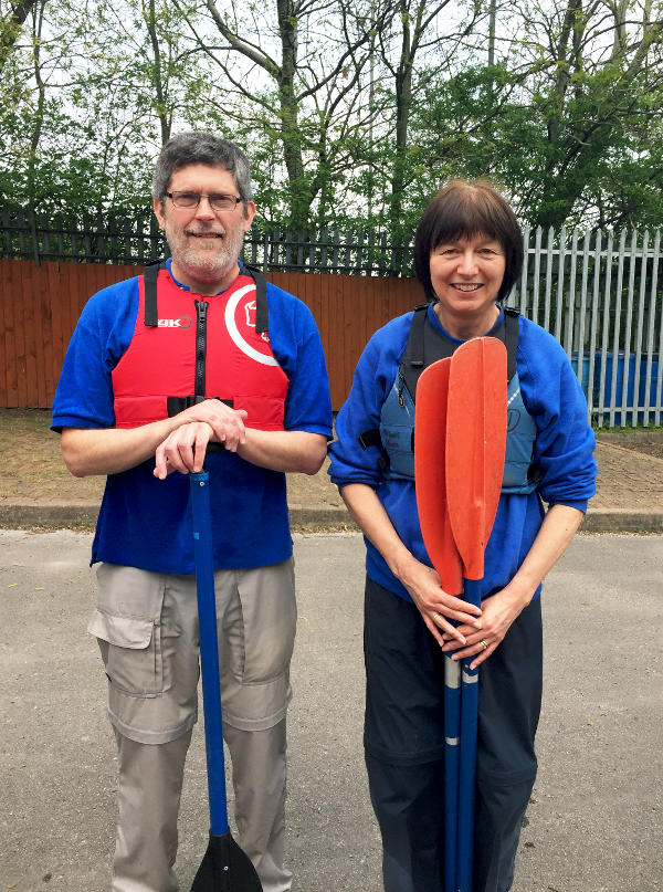 Martin and Dilys holding kayak oars