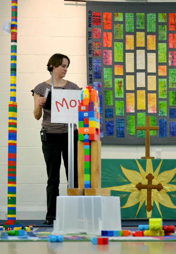 Rachel with a tower of Lego bricks