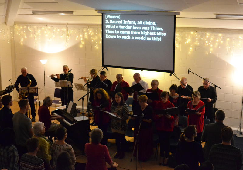 The choir leading singing at the Carol Service