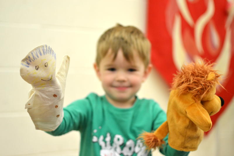 Playing with puppets at Messy Church