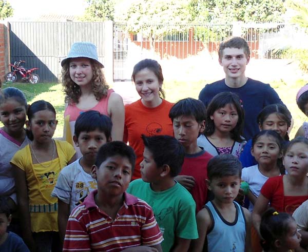 Beccy and Dan with younger people in Bolivia