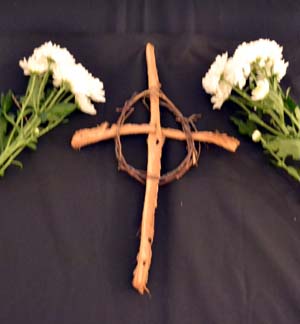 A small cross between two flowers