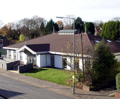 The Christ Church building viewed from a skylight across the road