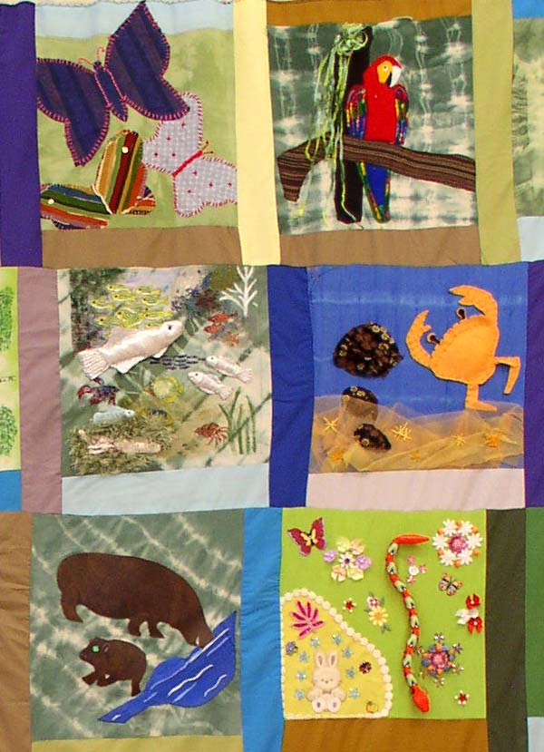 Tropical birds, a crab, a fish and a snake