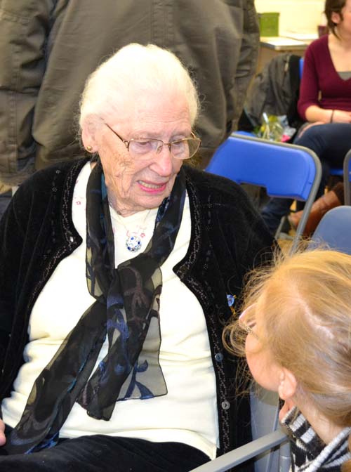 Daisy Glenn in conversation with a much younger person