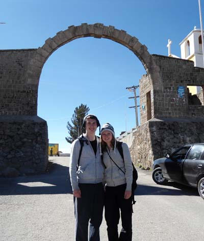 Dan and Beccy in front of a historic arch
