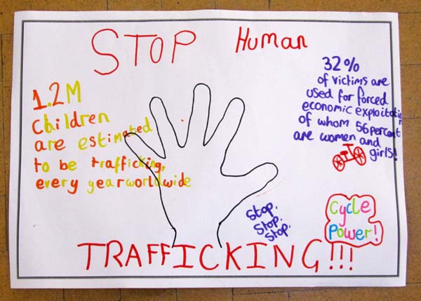 A hand-drawn poster highlighting some statistics concerning human trafficking