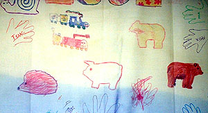 Handprints and animals drawn on a multi-coloured background